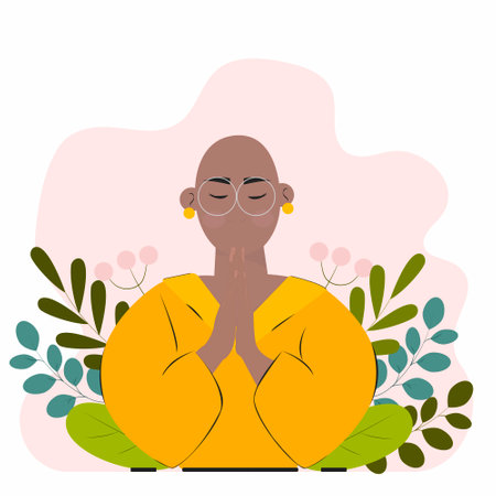 A shaved girl prays in a yellow kimono in a monasteryのイラスト素材