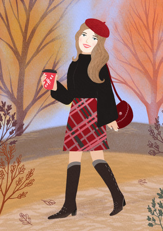 Young woman walking in the autumn park and drinking coffee in a cupの写真素材