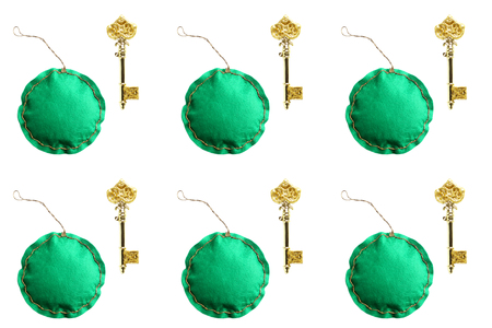 Christmas concept. pattern from handmade toys and golden keys, on white background. flat lay, top viewの写真素材