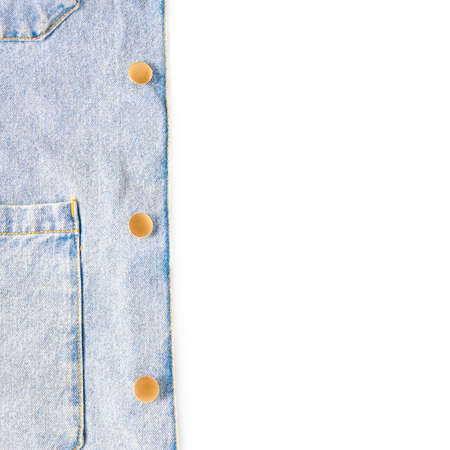 online shopping concept. texture denim jacket in blue with gold buttons close-up. white background,...