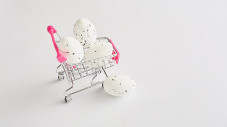 Easter eggs of white color with a speck in a produce basket on a white background. happy Easter mockup with copy spaceの写真素材