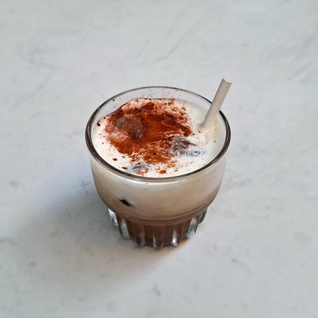 Traditional Vietnamese iced coffee with salty cream foam, served in a glass