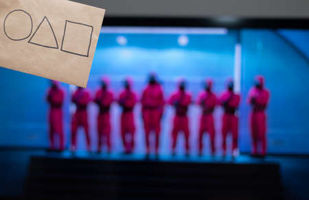 Moscow, Russia - October, 19, 2021. Outstretched hand with a card with the logo of the Netflix...
