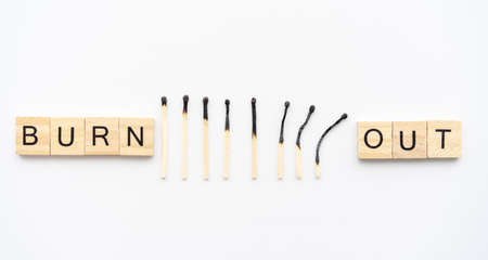 Burnt matches and the inscription burnout. Metal burnout and stress concept.の写真素材