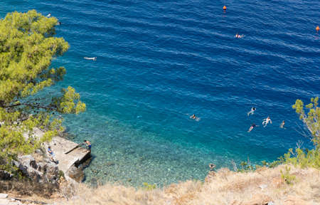 Greek rocky coastline of the mediterranean sea. Natural background