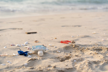 Garbage on the Dubai beach. The concept of the problem of pollution of the world oceanの写真素材