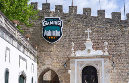 Obidos, Portugal. May 03, 2023. The inscription on the medieval castle in Obidos - Obidos Vila Gamingのeditorial素材
