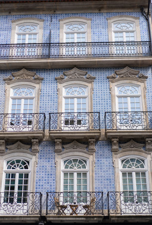 Porto, Portugal. April, 30, 2023. Facade of a historic building covered with azulejo tiles in the center of Portoのeditorial素材