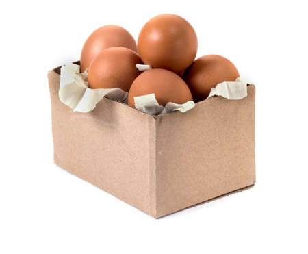 Carton box with eggs isolated on white background, shopping and buying food concept.