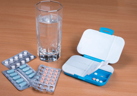Pill box daily take a medicine with pills and tablets. Drugs use for treatment and cure the disease....