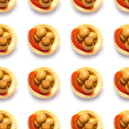 Seamless pattern with mushroom tartlets isolated on white background, food patternの写真素材