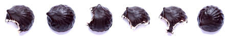 Set of chocolate marshmallows isolated on white background. Homemade bite cookies. Top view