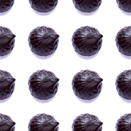 Seamless pattern with chocolate marshmallows isolated on white background. Homemade cookies. Top viewの写真素材
