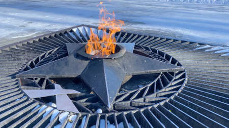 Burning fire and star - symbol of memory about Second World War.