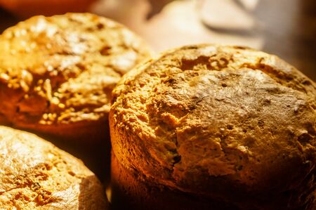 Close up of homemade fresh crusty bread on blurred backgroundの写真素材