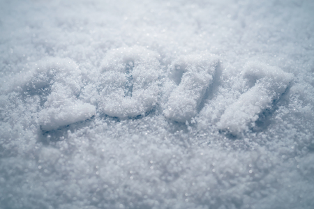 Happy New Year creative holiday background - 2017 new year sign text written in snow, 3D