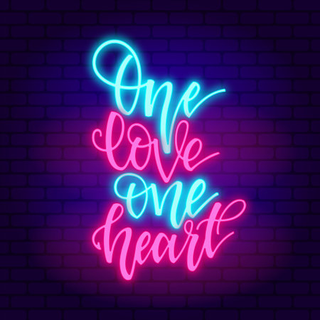 One love. Glowing pink and blue neon incription on dark brick wall backgroundの写真素材