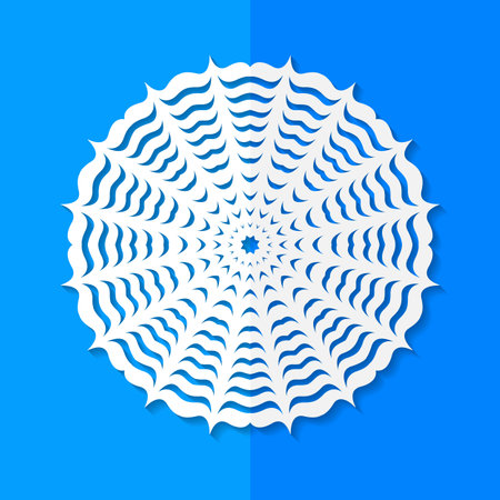 illustration of white paper snowflake on blue background.の写真素材