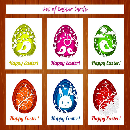 Set of Easter cards with colorful eggs in paper cutting style on wooden background. Imitation paper art style. Template for greeting Easter cards.の写真素材