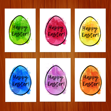 Set of Easter cards with colorful eggs on wooden background. Imitation of watercolor. Template for greeting Easter cards.の写真素材