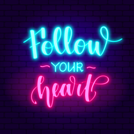 Follow your heart. Glowing pink neon incription on dark brick wall background.のイラスト素材