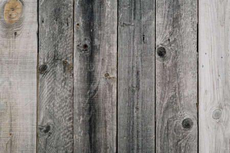 Dark gray old vintage wooden background with vertical boardsの写真素材