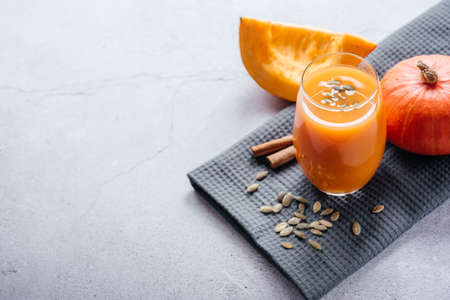 Raw pumpkin juice with parsley and pumpkin seeds top viewの写真素材