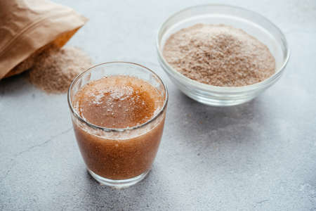 A glass of water soluble psyllium husk dietary fiber supplementの写真素材