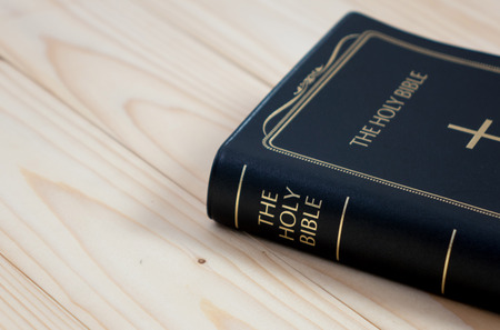 holy bible on wood tableの写真素材