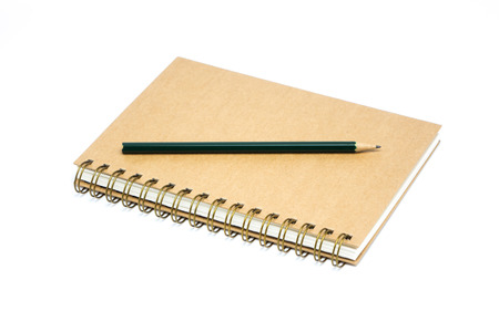 Recycle brown paper notebook and pencil on white backgroundの写真素材