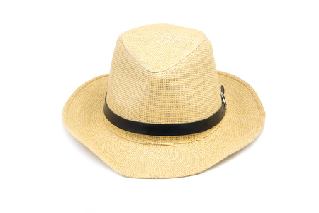 A Cheap summer hat made of straw on white backgroundの写真素材