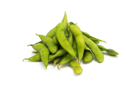 green soybeans on white background