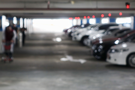 Abstract blur car parking lot interior for background