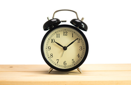 retro alarm clock on white backgroundの写真素材