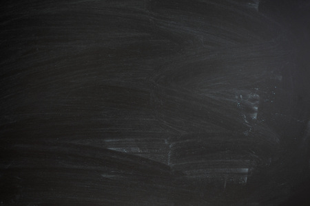Abstract Chalk rubbed out on blackboard for backgroundの写真素材