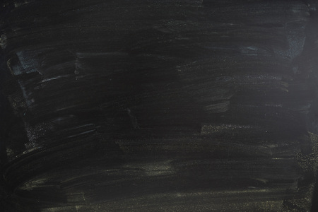 Abstract Chalk rubbed out on blackboard for backgroundの写真素材