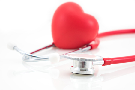 Stethoscope and red heart on white backgroundの写真素材
