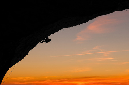 Climber silhouette with sunset.の写真素材