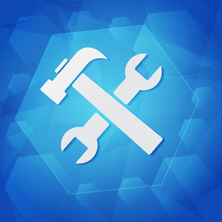 tools sign - white symbol over blue の写真素材