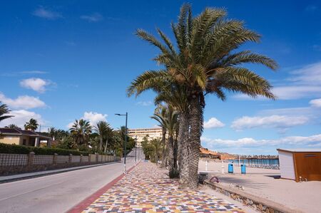 Orihuela Costa, Alicante, Spain - April, 2019: New colorful road pavement on Campoamor beach