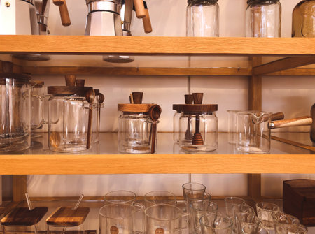 Wooden shelves with kitchen goods in Zara boutiqueのeditorial素材