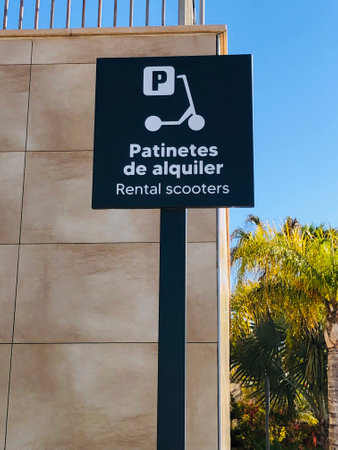 Alicante, Spain - April 24, 2025: Sign for public electric scooter parkingの写真素材