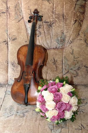 bouquet of wedding flowers before the wedding and violinの写真素材