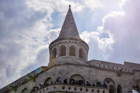 Budapest, Hungary - may, 2019: tourists on the observation deck of the Fishing Bastion. Fisherman's Bastion is an architectural structure on the hill in Buda, the attractions of the Hungarian capital.のeditorial素材