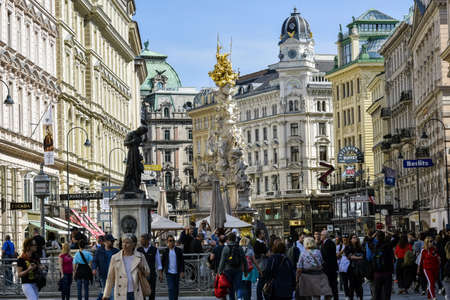Austria, Vienna- may 2019: tourists near Plague column (Holy Trinity Column) on Graben street in Vienna city in springtime. Plague column was inaugurated in 1693 after end of last big plague epidemicsのeditorial素材