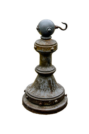 Metal restriction post with hook isolated on white background. Rust-covered restriction column. Old...