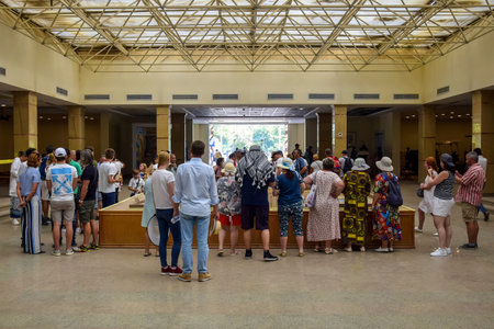 Travel tour group goes to Karnak Temple. Beautiful Egyptian landmark with hieroglyphics, decayed temples, obelisks and other buildings. Luxor, Egypt - October 2021のeditorial素材