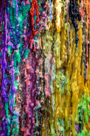 Abstract multicolored background of streaks of wax candles. Stripes of different colors. close-up. selective focus.の写真素材