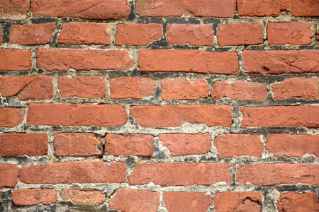 Red brick wall texture, abstract brickwork. Brick wall of an old building. selective focus.