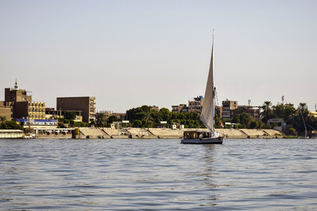 Excursion boat sails on Nile River. Vacation, leisure and adventure travel. Luxor, Egypt - October 2021のeditorial素材